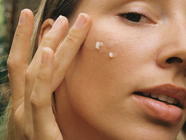 Tallow balm being applied to the face