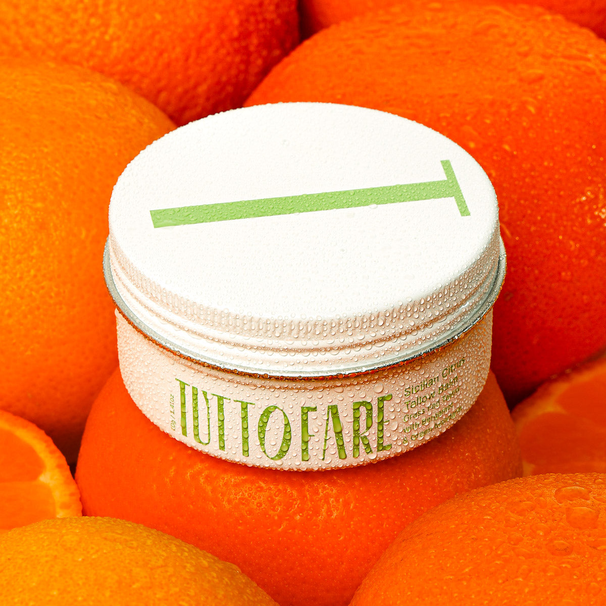 Natural ingredients in TUTTOFARE Sicilian Citrus Tallow Balm including Australian grass fed and grass finished beef tallow and botanicals green tangerine and orange